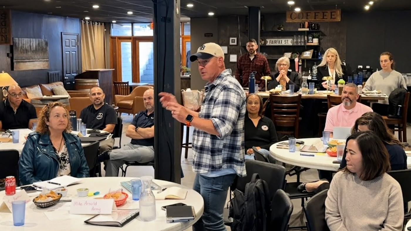 Veterans in a hands-on AI session at The Outpost